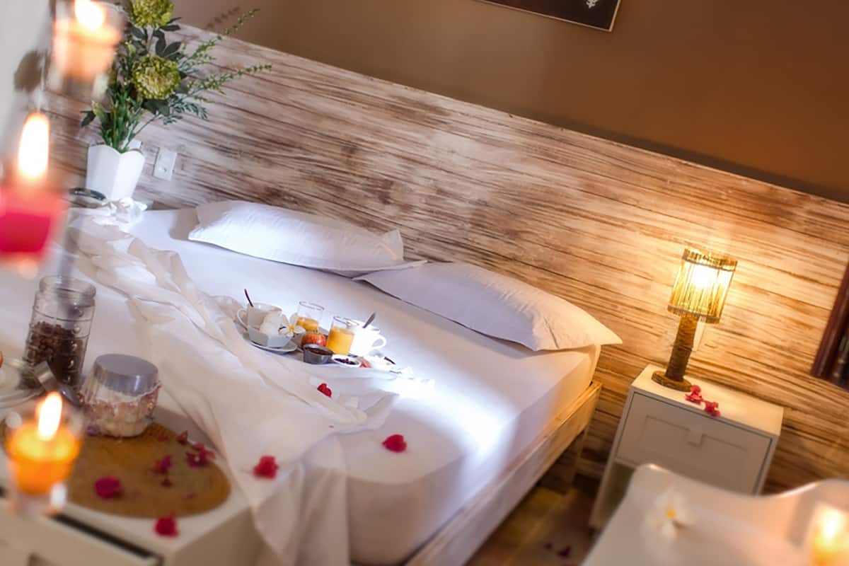 deluxe apartment, pool view | 1 bedroom, in-room safe, desk, laptop workspace