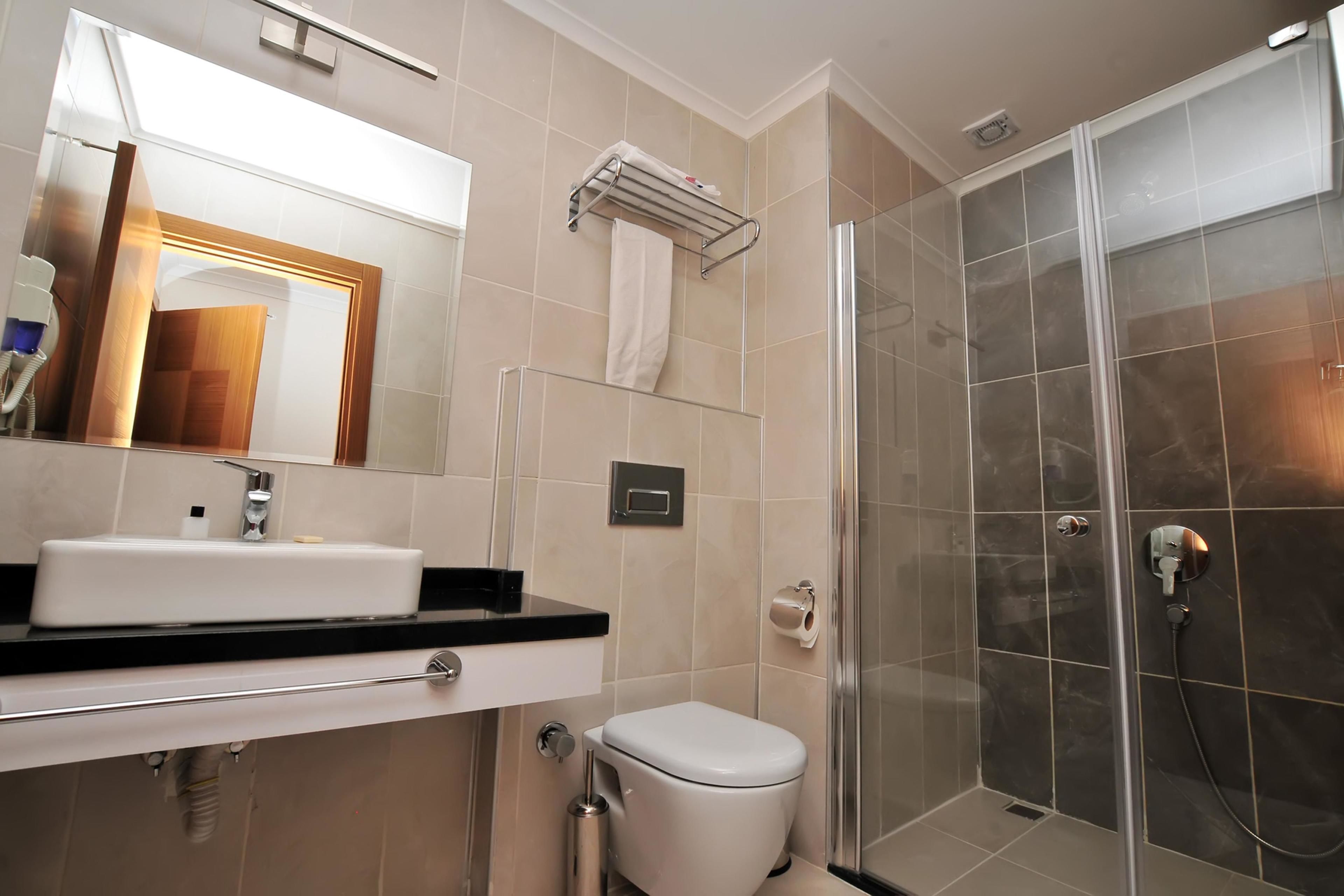 shower, free toiletries, hair dryer, slippers