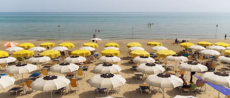 On the beach, white sand