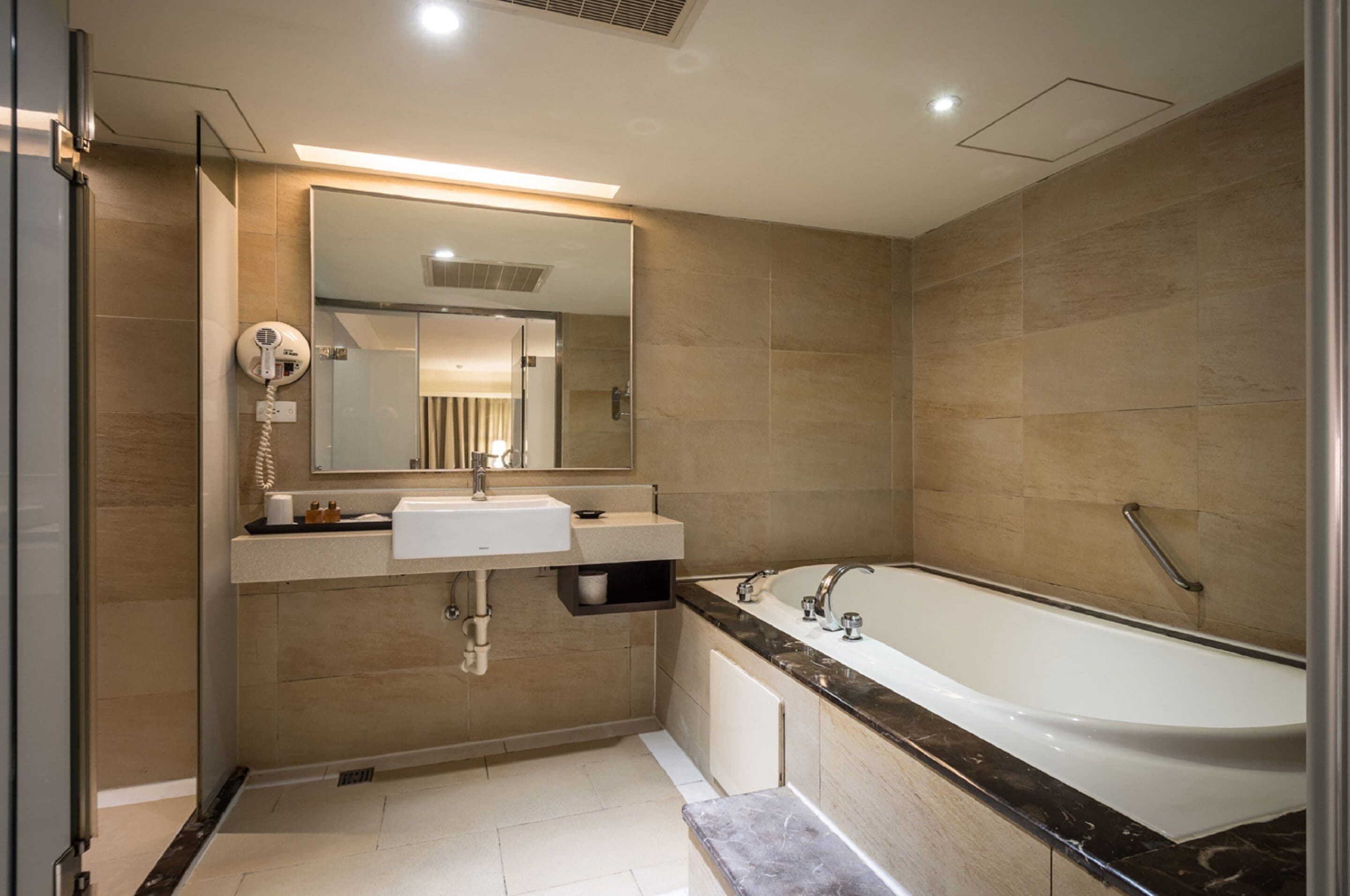 deluxe twin room, 2 double beds | bathroom | shower, free toiletries, hair dryer, slippers