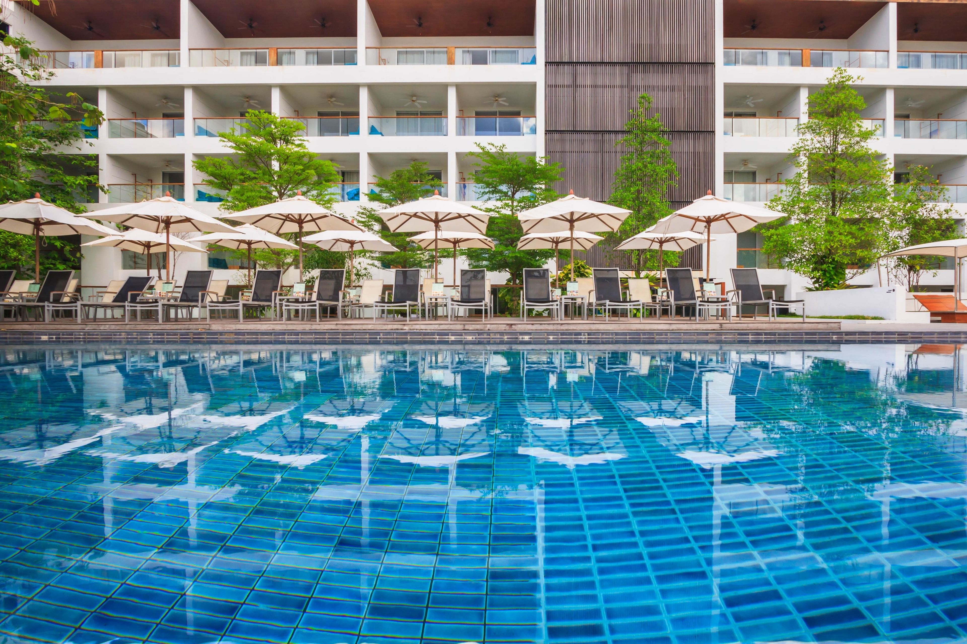 indoor pool, outdoor pool, open 8:00 am to 8:00 pm, pool umbrellas