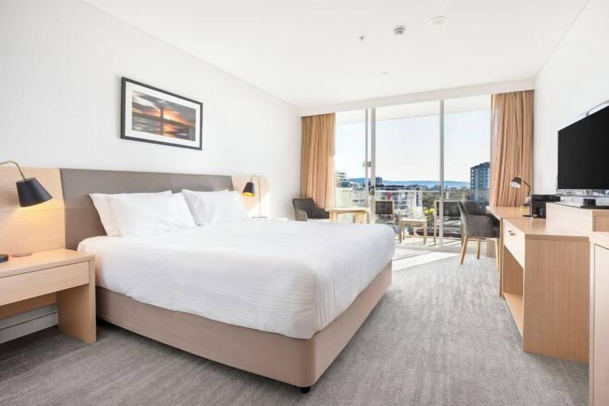 Luxe beddengoed, pillowtop-bedden, een kluis op de kamer, een bureau