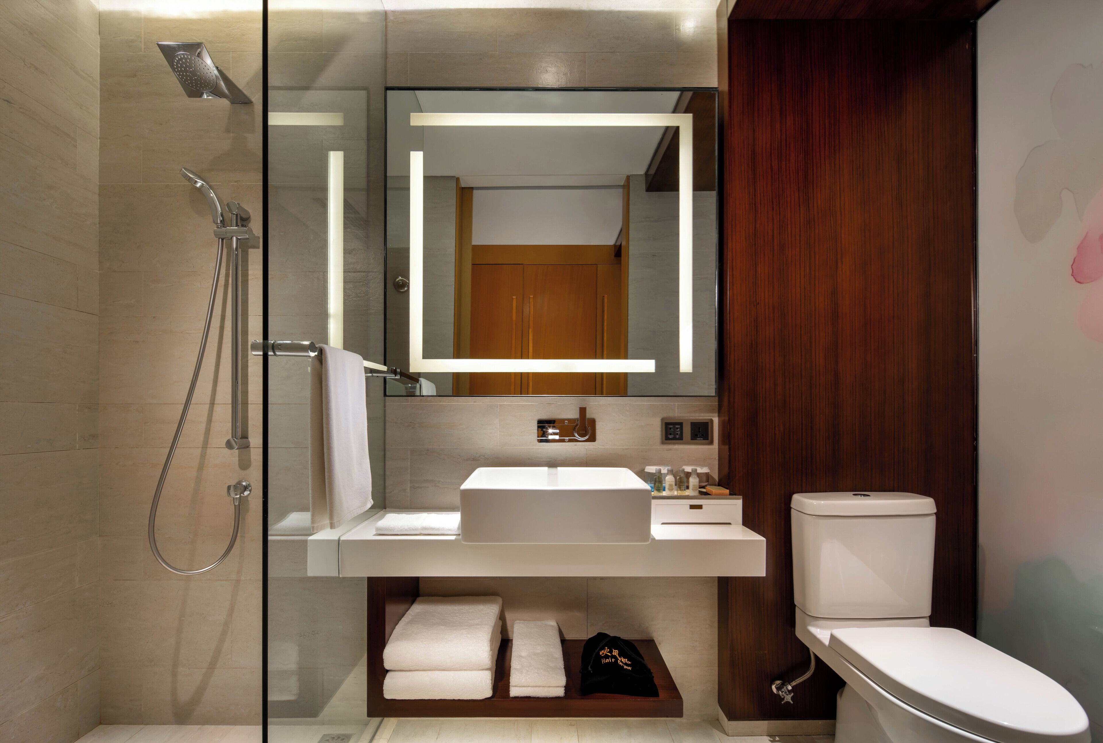 free toiletries, hair dryer, slippers, bidet