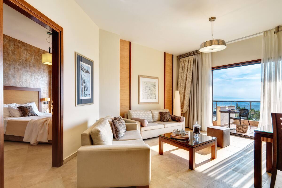 Suite, Beachfront (OLYMPIA) | Living area | TV