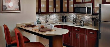 Coffres-forts dans les chambres, fer et planche à repasser