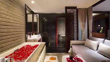 Separate bathtub and shower, free toiletries, hair dryer, bathrobes