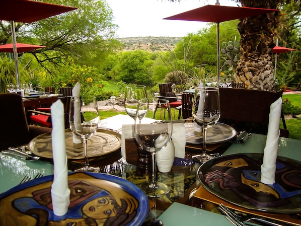 Breakfast, lunch, dinner served; international cuisine, pool views