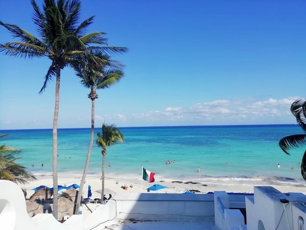 Private beach, white sand, sun-loungers, beach umbrellas