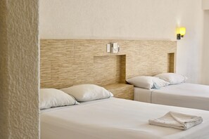 Standard Room, 2 Double Beds, Oceanfront | Minibar, in-room safe, bed sheets