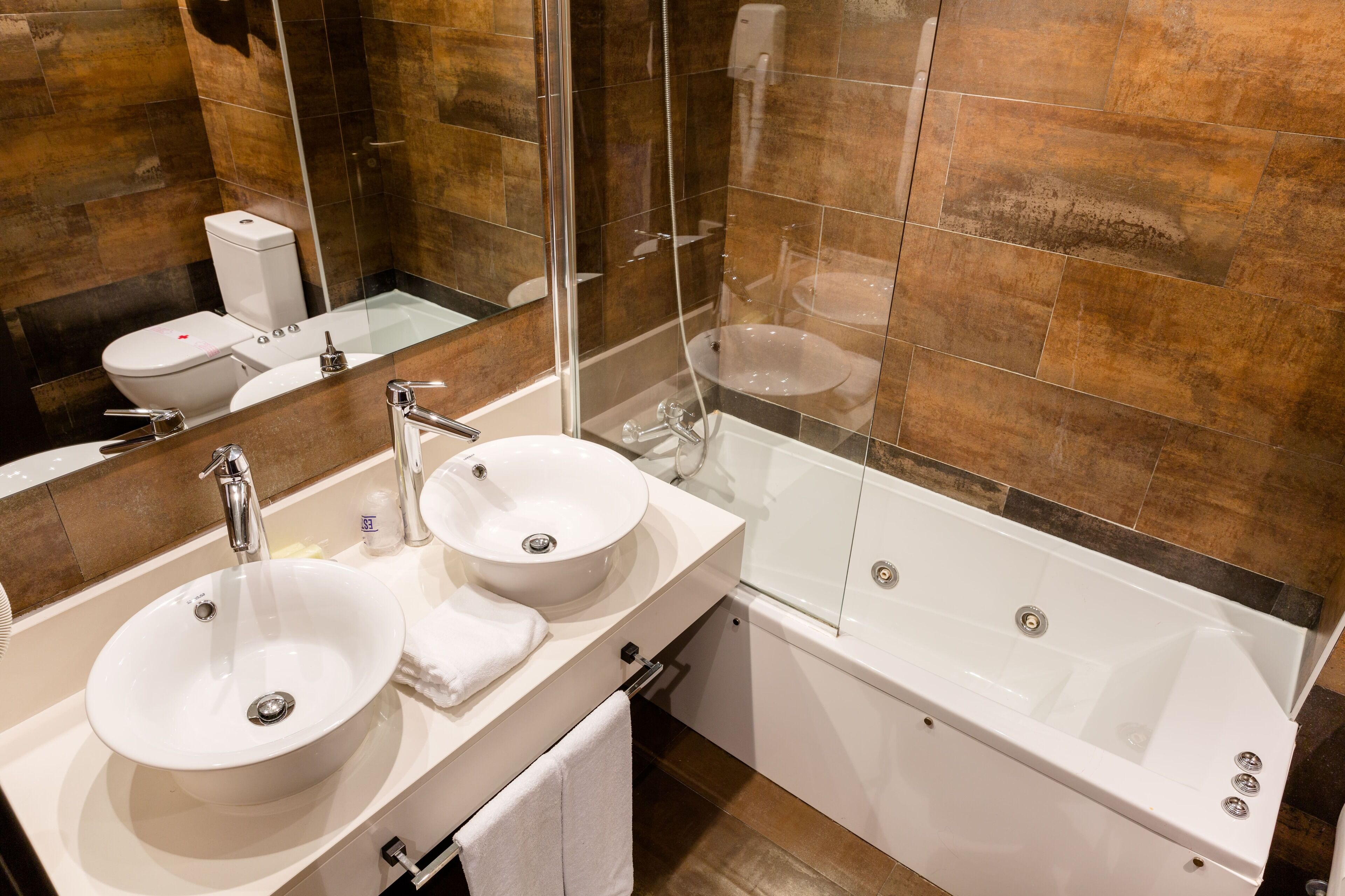 double or twin room, jetted tub | bathroom | hair dryer, towels