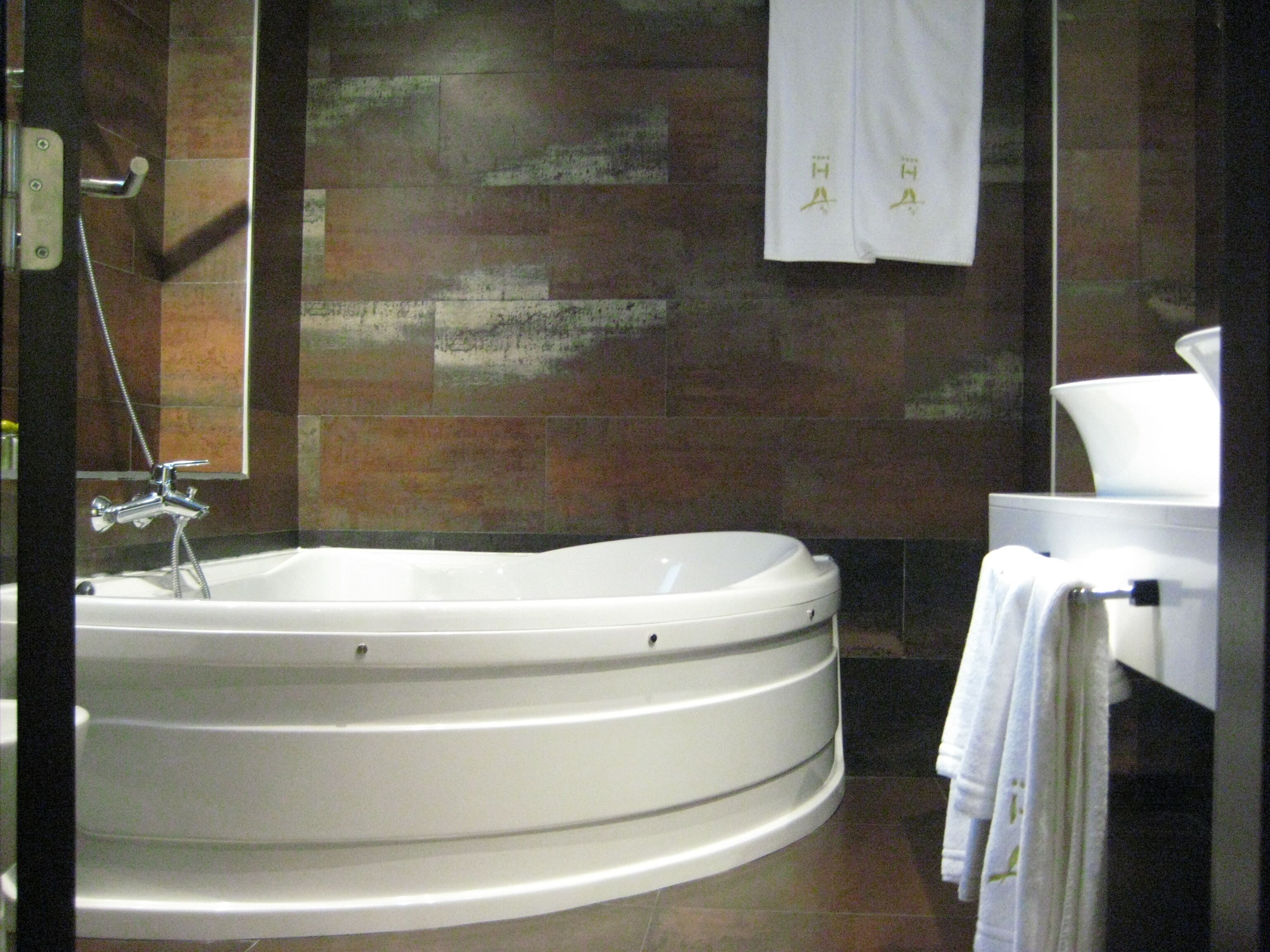 junior suite | bathroom | hair dryer, towels