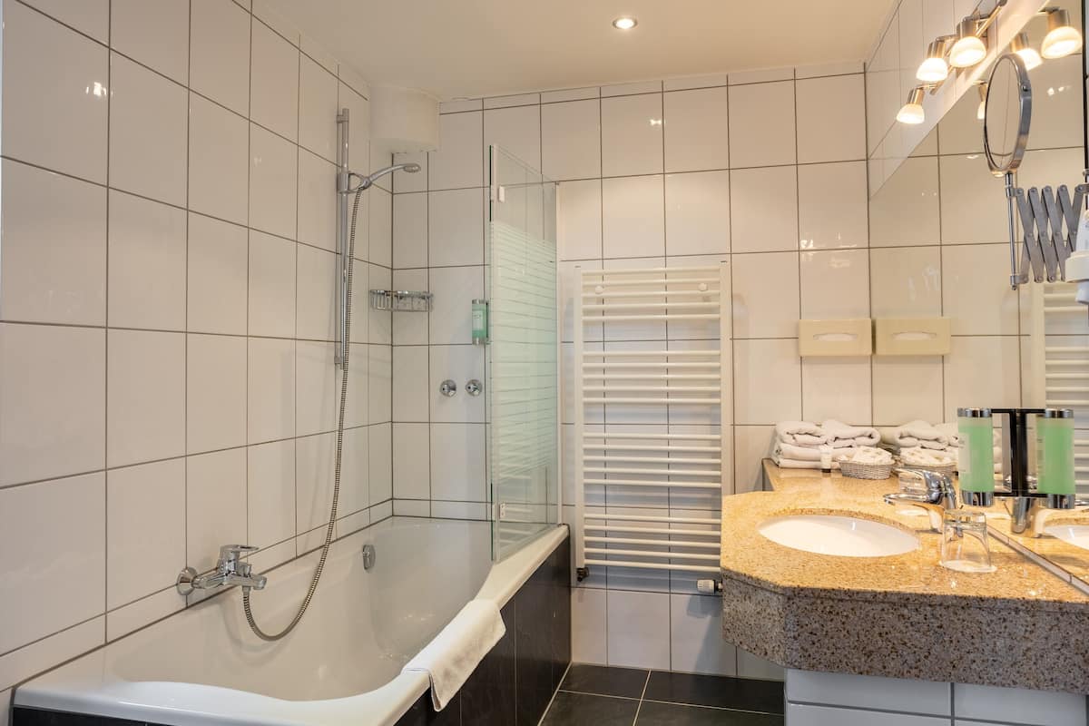 suite | bathroom | hair dryer, towels