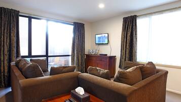 Suíte premium, 2 quartos, para não fumantes, cozinha | Área de estar