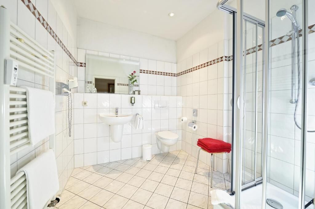 classic suite | bathroom | hair dryer, towels