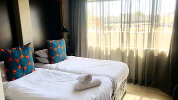 Family Room (First Floor) | 3 bedrooms, minibar, individually decorated, individually furnished