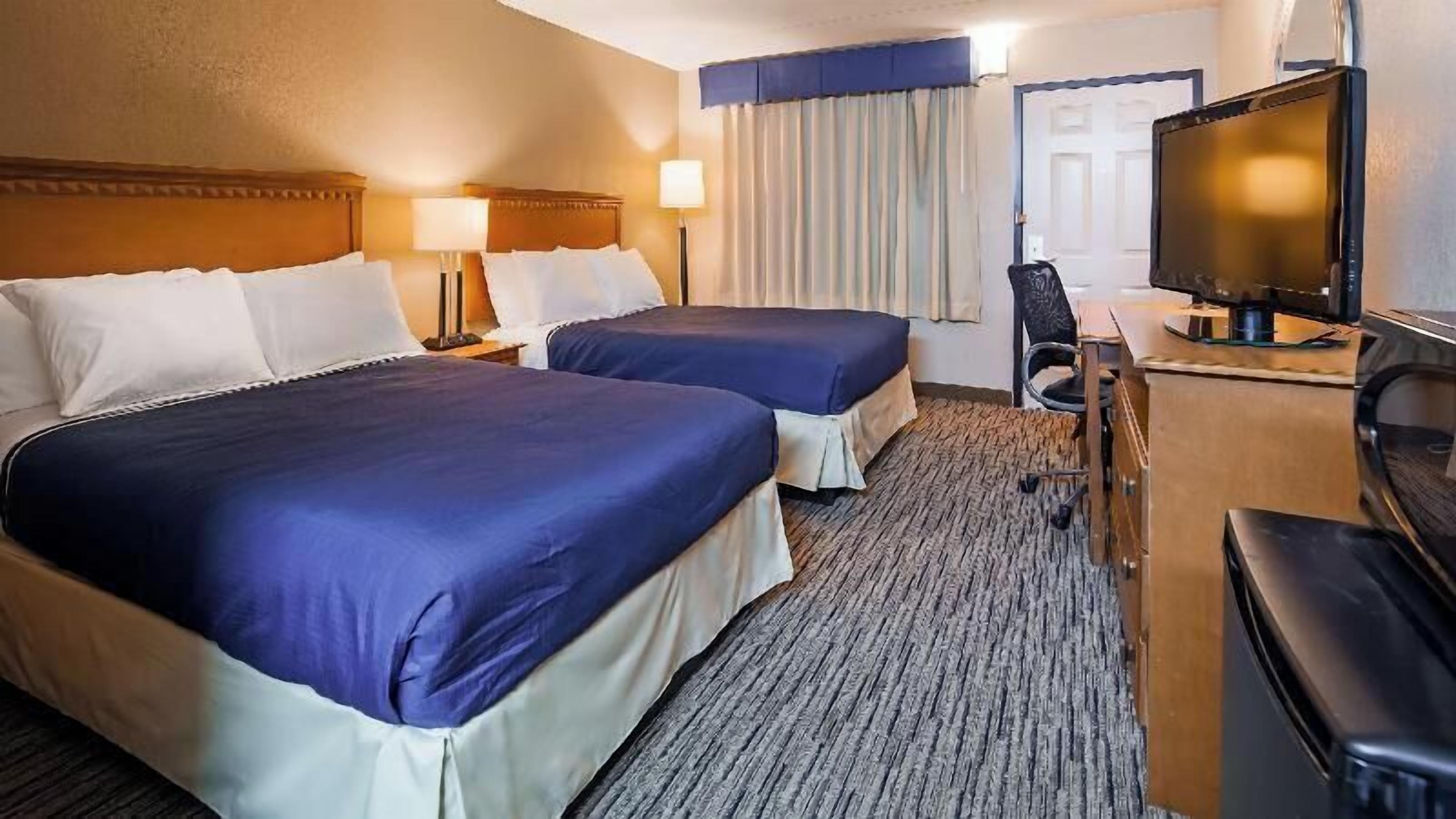 Premium bedding, laptop workspace, iron/ironing board, WiFi