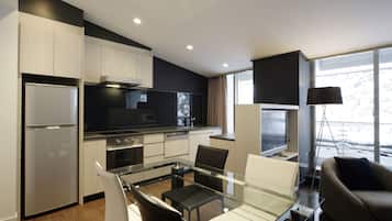 Fridge, microwave, electric kettle, cookware/dishes/utensils