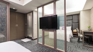 Deluxe Quadruple Room, 2 Queen Beds | Free minibar, in-room safe, desk, soundproofing