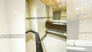 A modern bathroom with a wooden ceiling, a large mirror, a sink, and a shower area. - Han She Hotel (Taipei)