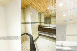 Deluxe Quadruple Room, 2 Queen Beds | Bathroom | Rainfall showerhead, hair dryer, slippers, towels