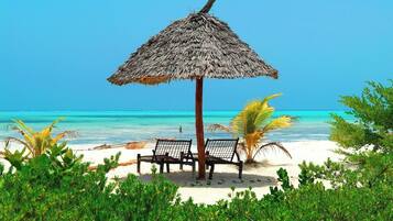 En privat strand, snorkling, volleyball, fiskeri