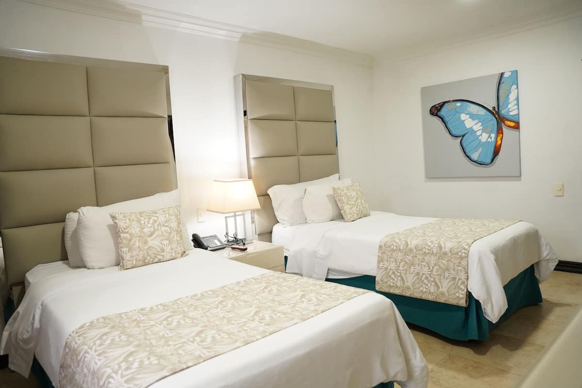 Ropa de cama de alta calidad y minibar