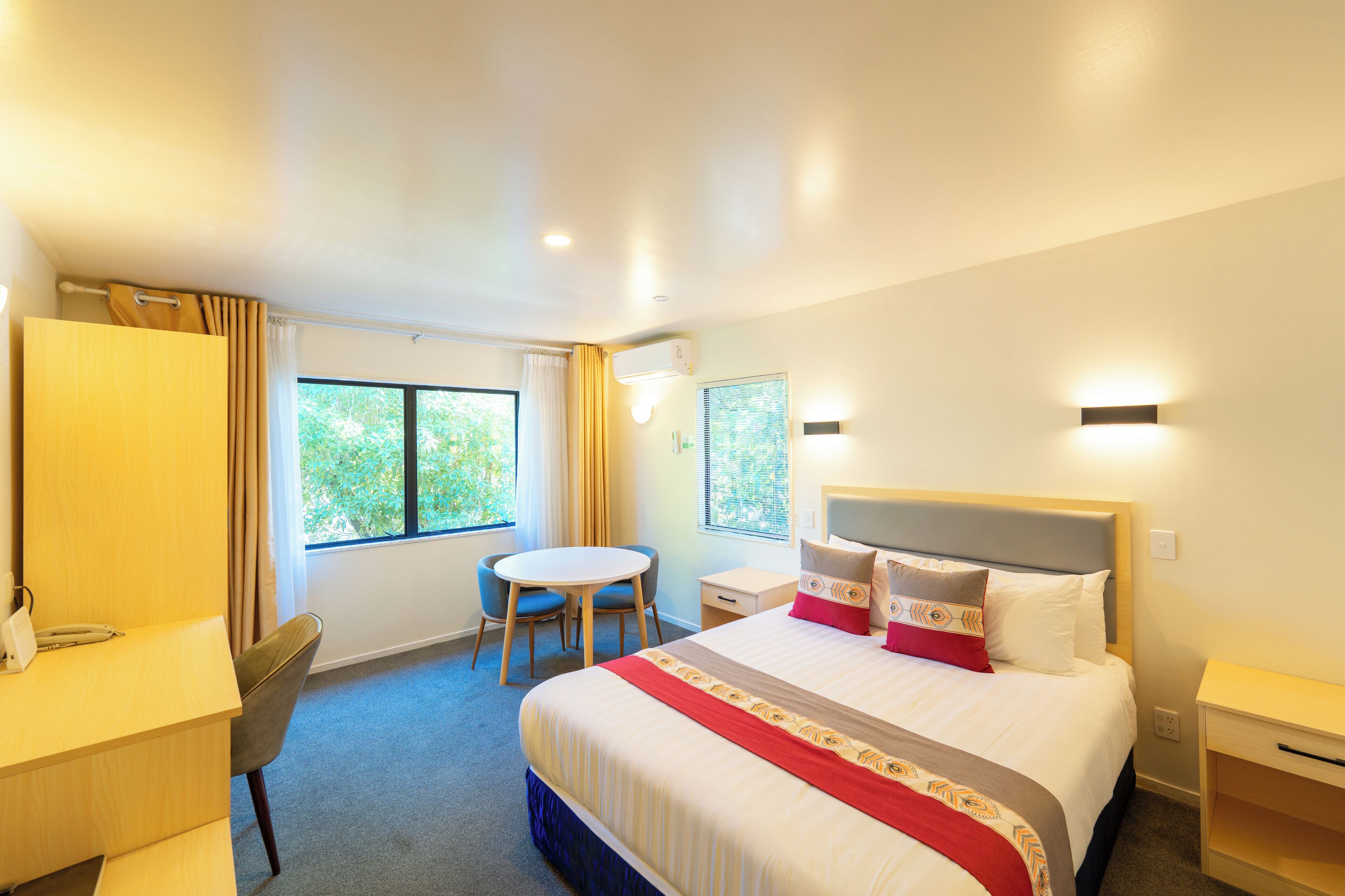 Queen Studio | Premium bedding, desk, laptop workspace, blackout drapes