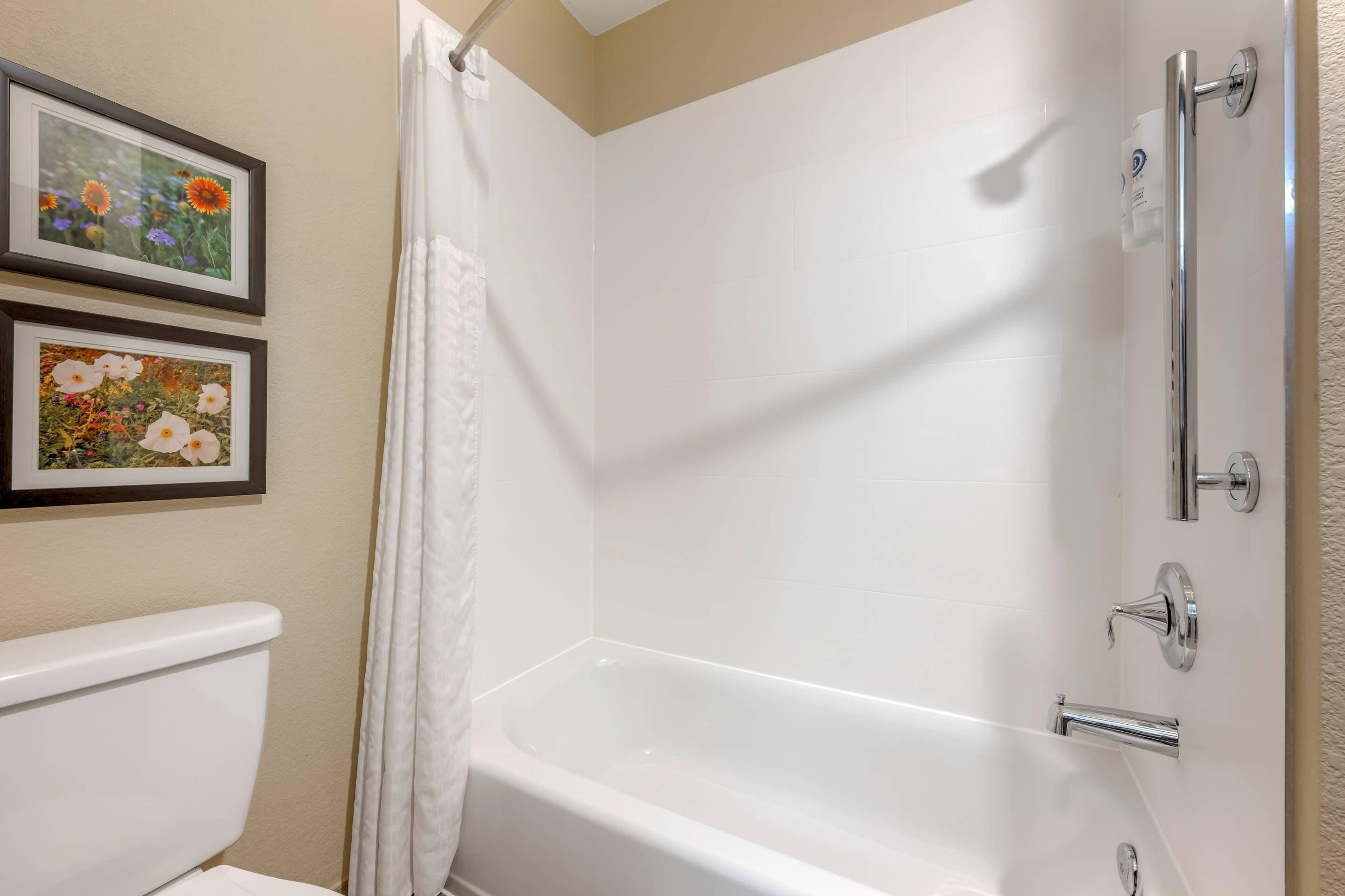 desk, laptop workspace, blackout curtains, iron/ironing board