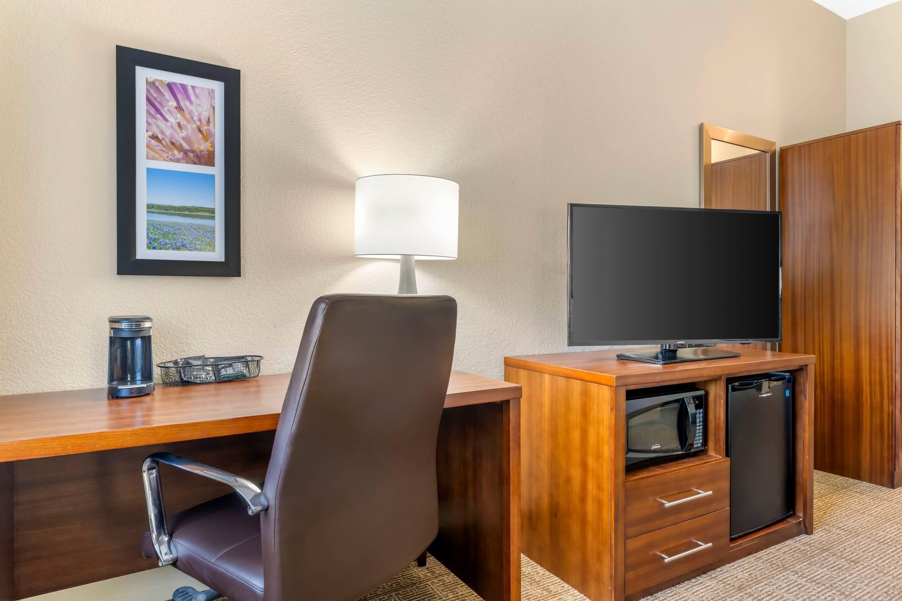 desk, laptop workspace, blackout curtains, iron/ironing board