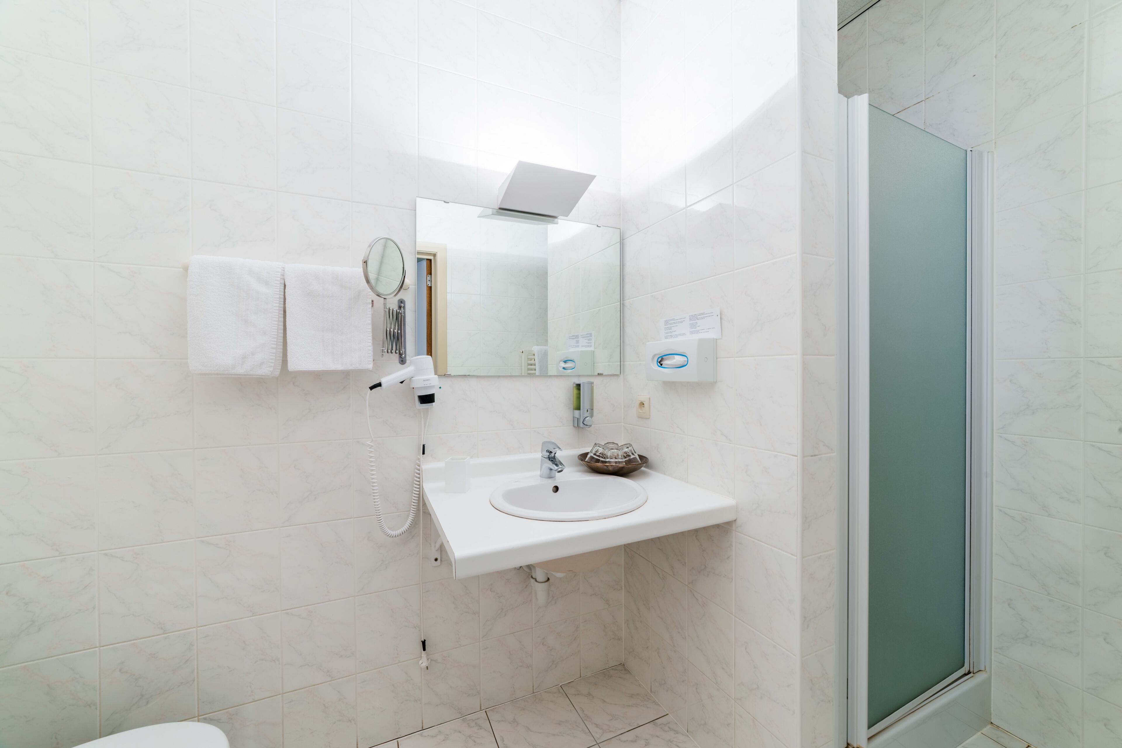 deluxe quadruple room | bathroom | shower, free toiletries, hair dryer, towels