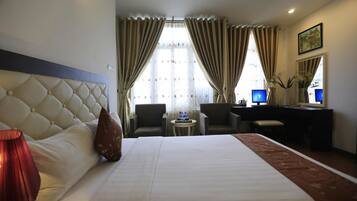 Kahden hengen perhehuone, 2 parisänkyä | Ylelliset vuodevaatteet, memory foam -patjalliset sängyt, minibaari