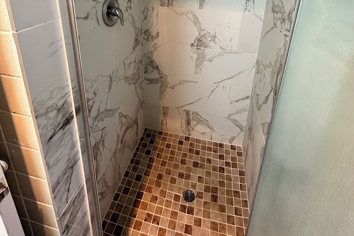 Shower, free toiletries, hair dryer, towels