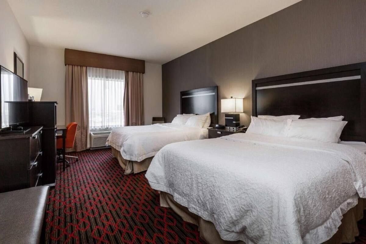 Hypo-allergenic bedding, pillowtop beds, in-room safe, desk