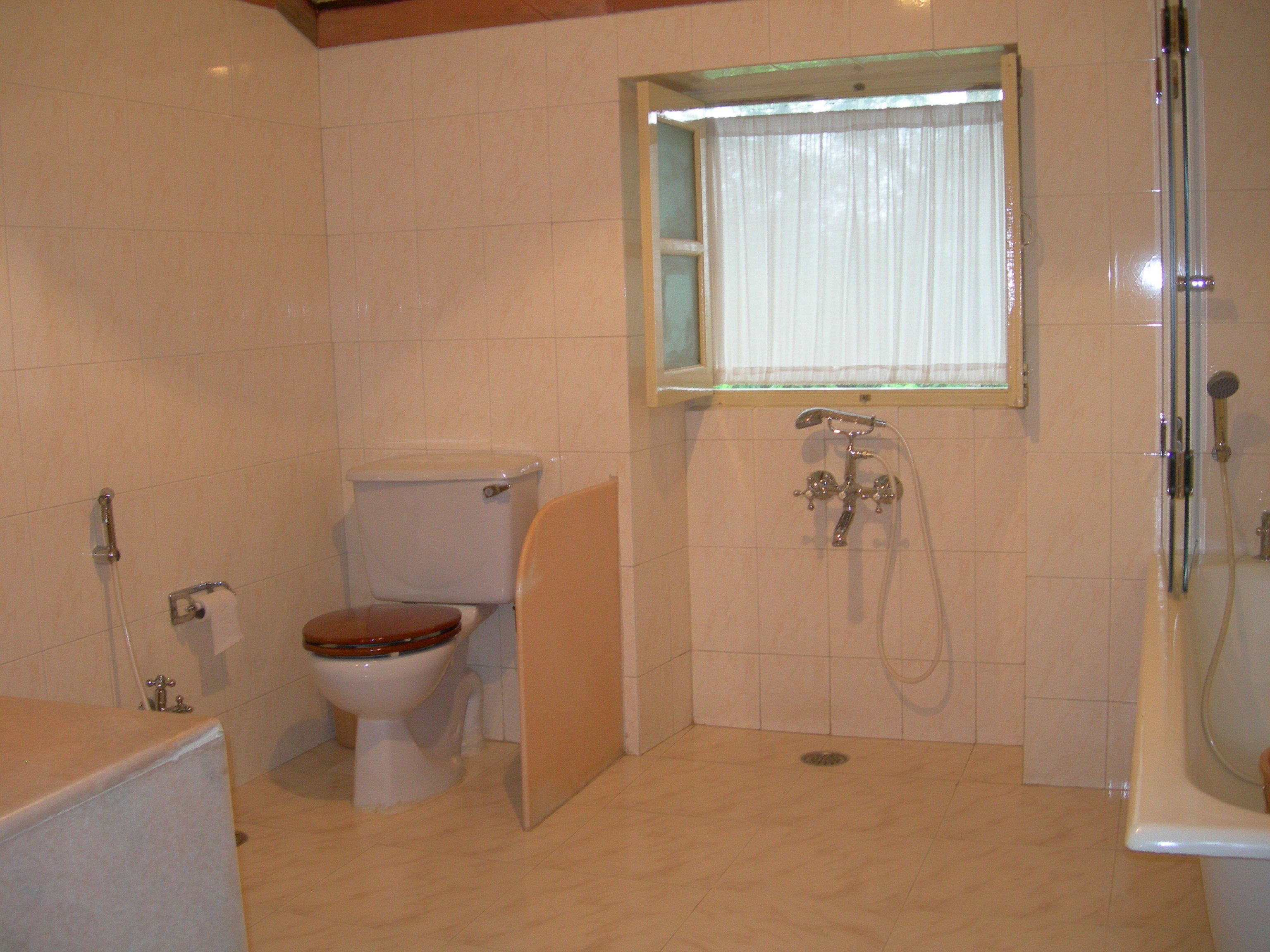 cottage | bathroom | designer toiletries, hair dryer, bathrobes, slippers