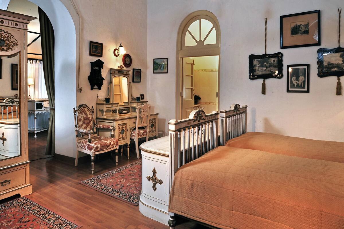 cottage | in-room safe, desk, blackout curtains, iron/ironing board