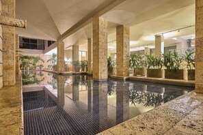 Indoor pool, open 9 AM to 7 PM, pool loungers