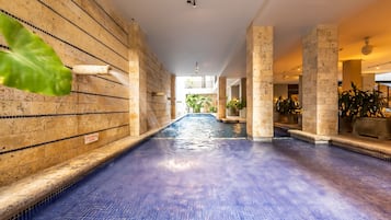 Indoor pool, open 9 AM to 7 PM, sun loungers