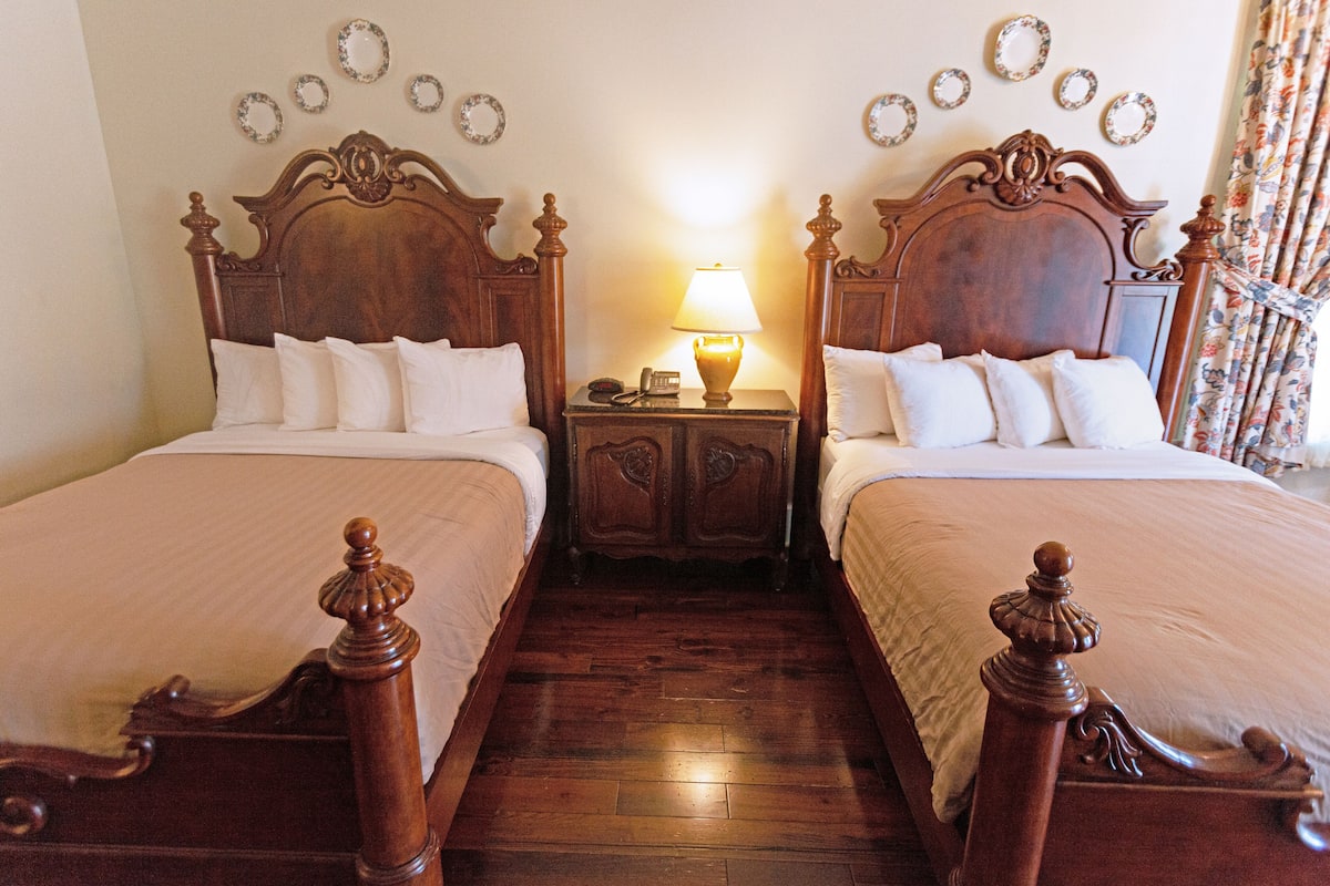Deluxe Cottage, 2 Queen Beds, Non Smoking | In-room safe, iron/ironing board, individually decorated