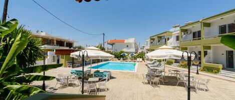 Outdoor pool, pool umbrellas, pool loungers