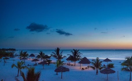 Private beach, white sand, free beach cabanas, sun loungers