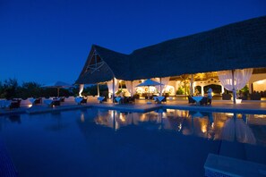 Outdoor pool, free cabanas, pool umbrellas