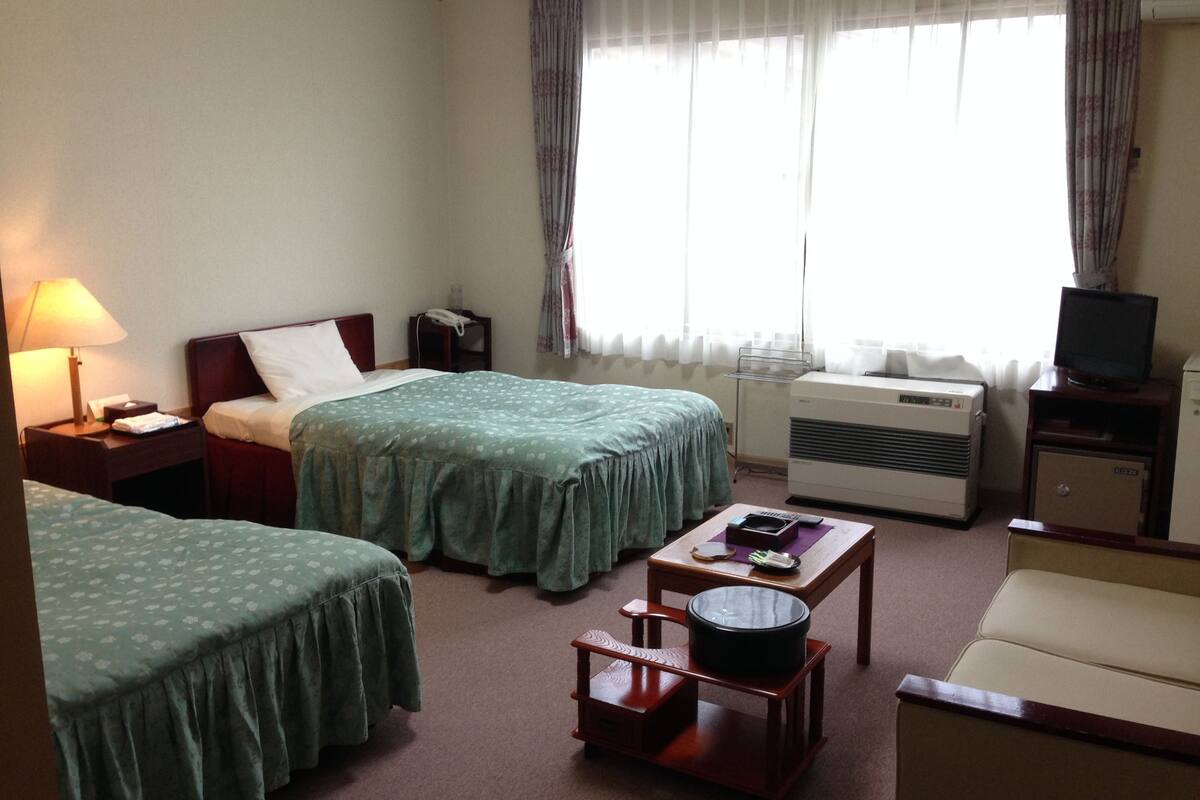 standard room, lake view, lakeside | living area | lcd tv