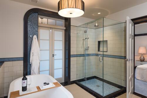Designer toiletries, hair dryer, bathrobes, slippers