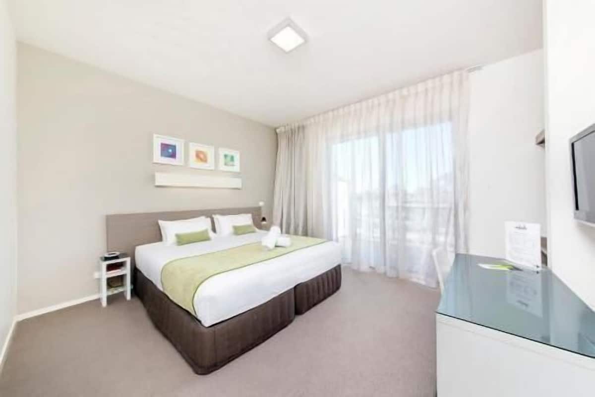 Premium bedding, down comforters, pillowtop beds, desk
