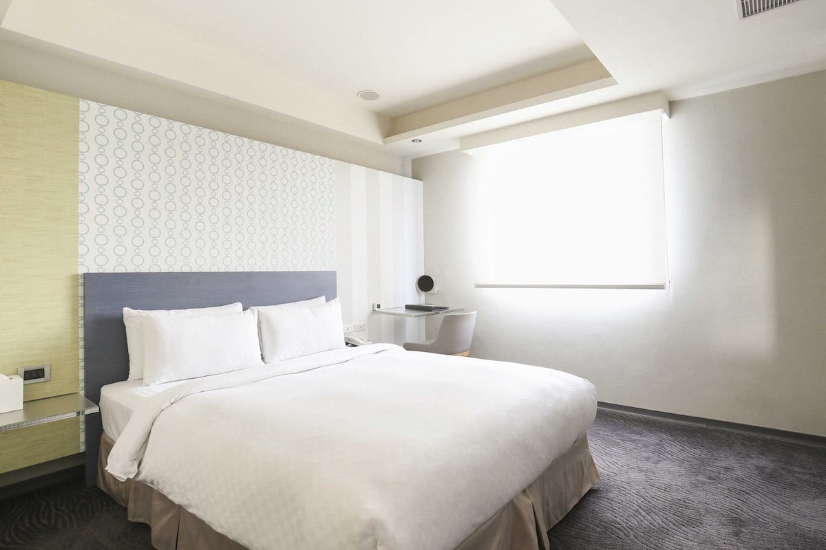 Habitación Deluxe | Ropa de cama de alta calidad, edredón y camas con pillow-top