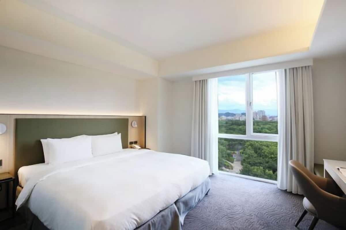 Premium bedding, down comforters, pillowtop beds, free minibar