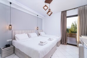 Standard Triple Room | Laptop workspace, iron/ironing board, free WiFi, bed sheets