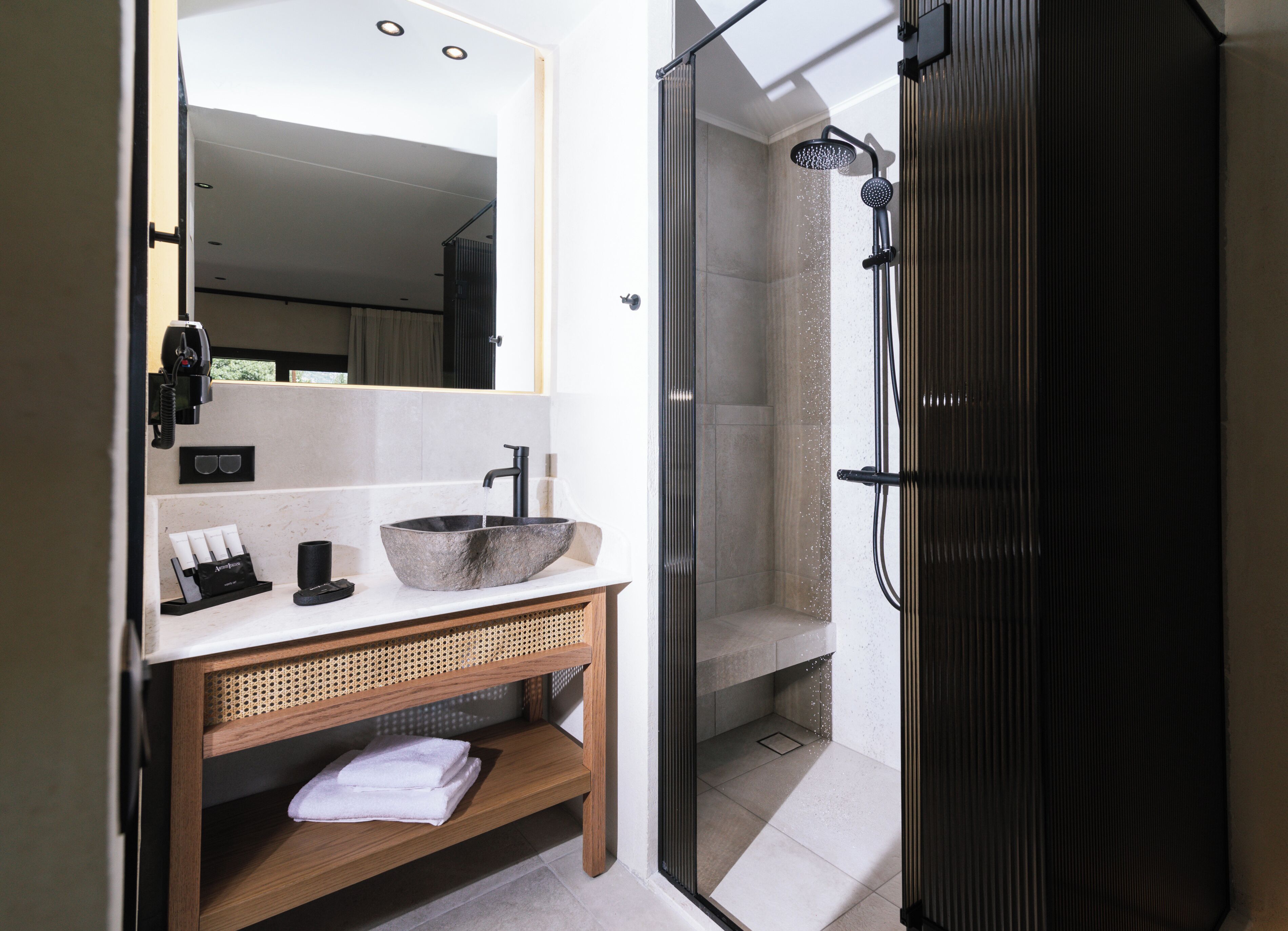 shower, rainfall showerhead, designer toiletries, hair dryer