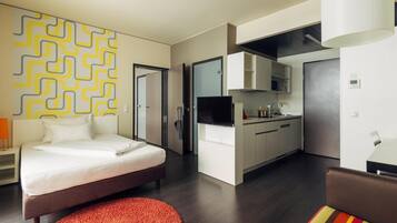 Departamento | Ropa de cama hipoalergénica y caja de seguridad en la habitación