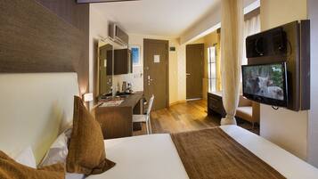 Quarto superluxo | Roupas de cama premium, frigobar, cofres nos quartos, escrivaninha